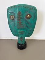 Groen stenen Masker met Decoraties, Ophalen