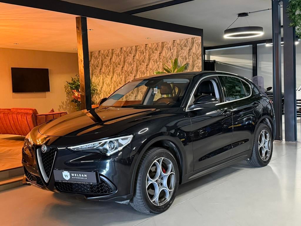 Alfa Romeo Stelvio 2.0 T AWD Super Garantie 280 PK Memory Le, Auto's, Alfa Romeo, Automaat, Zwart, 4 cilinders, Zwart