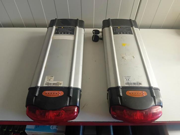 2 stuks defecte fiets accu's Vogue Yoku YK3610ZCRL2 36V, Fietsen en Brommers, Fietsaccessoires | Fietsaccu's, Gebruikt, Ophalen of Verzenden