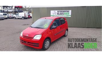 Koplamp links van een Daihatsu Cuore beschikbaar voor biedingen