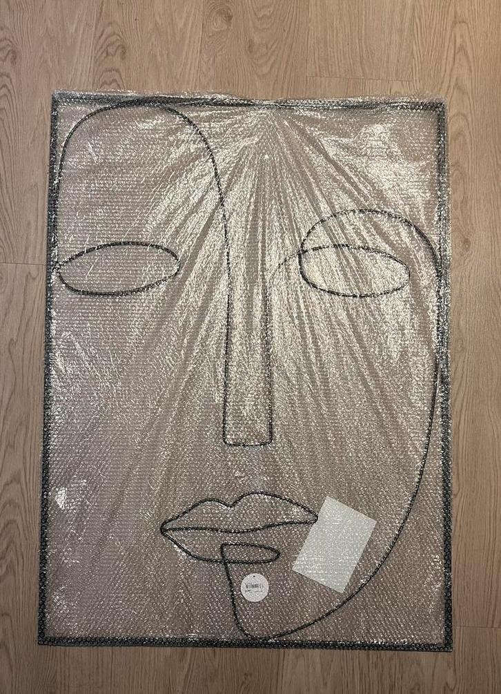 Zwarte metalen wanddecoratie gezicht, Huis en Inrichting, Woonaccessoires | Wanddecoraties, Nieuw, Ophalen of Verzenden