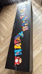Super mario slinger, Hobby en Vrije tijd, Feestartikelen, Ophalen of Verzenden, Zo goed als nieuw