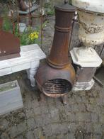 gietijzeren buitenkachel met deksel boven op, Ophalen