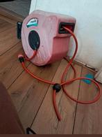 Te koop, Tuinslang met oprol hapsel.systeem15 meter, Tuin en Terras, Tuinslangen, Ophalen, Zo goed als nieuw, Tuinslang