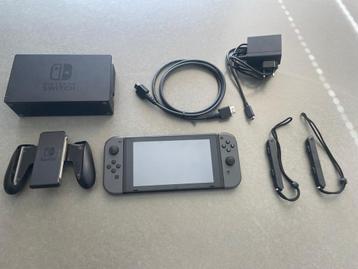 Nitendo switch 1 grijs met alles erbij beschikbaar voor biedingen