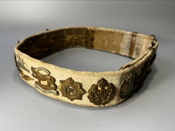 Riem met 17  emblemen (hate belt ww2) beschikbaar voor biedingen