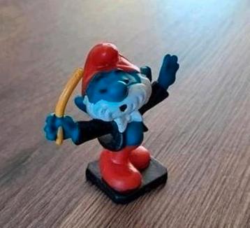Grote smurf als dirigent  beschikbaar voor biedingen