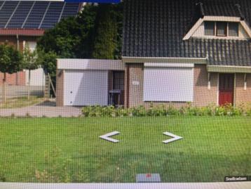 electrische witte garagedeur beschikbaar voor biedingen