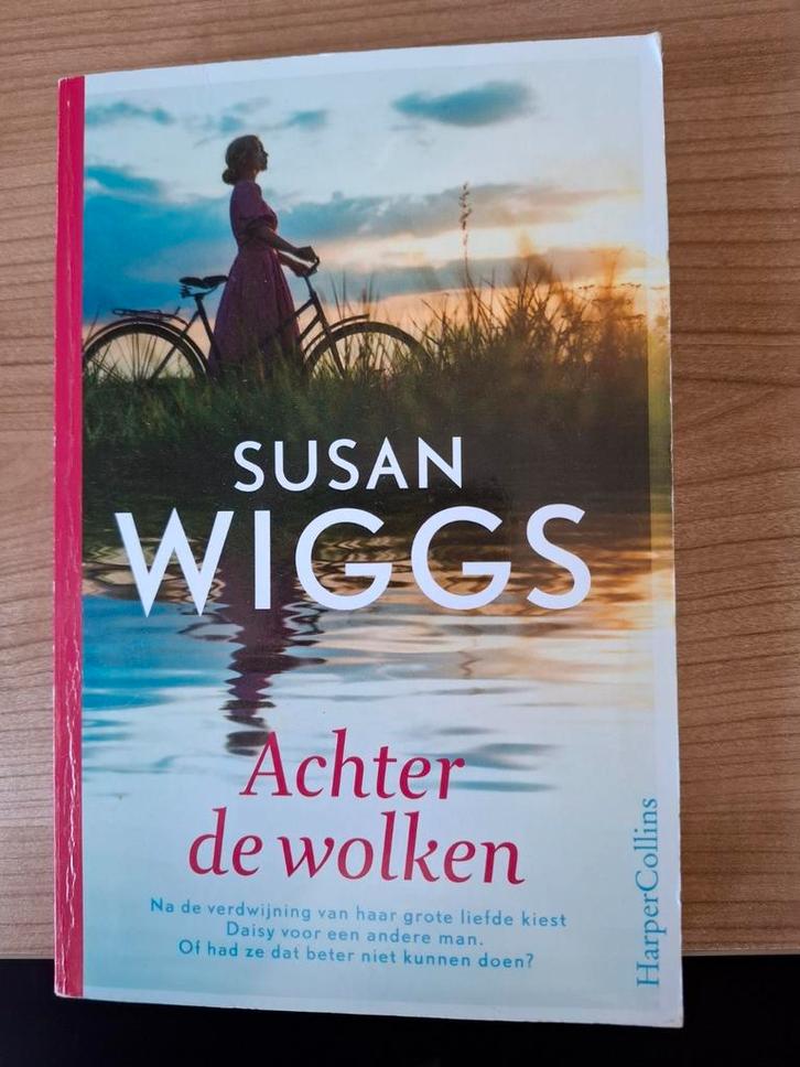 Achter de wolken - Susan Wiggs, Boeken, Romans, Zo goed als nieuw, Nederland, Ophalen of Verzenden