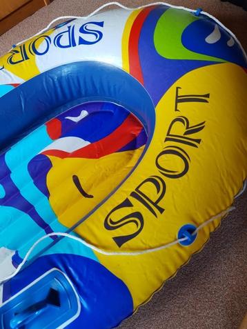 opblaasbaar bootje met peddels en evt. pomp beschikbaar voor biedingen