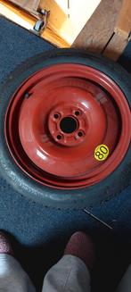 Thuiskomer band met velg, Ophalen