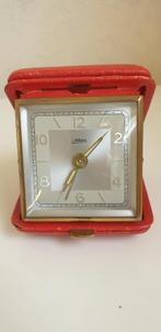 Vintage opwindbare KAISER reiswekker (rood), Antiek en Kunst, Antiek | Klokken, Ophalen of Verzenden