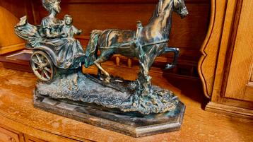 Bronzen beeld: Vrouw met kind in koets beschikbaar voor biedingen