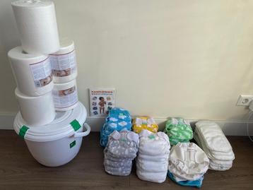 Groot pakket wasbare luiers maat 1 & 2 + accessoires beschikbaar voor biedingen