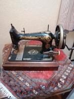 Antieke Slinger Naaimachine, Ophalen