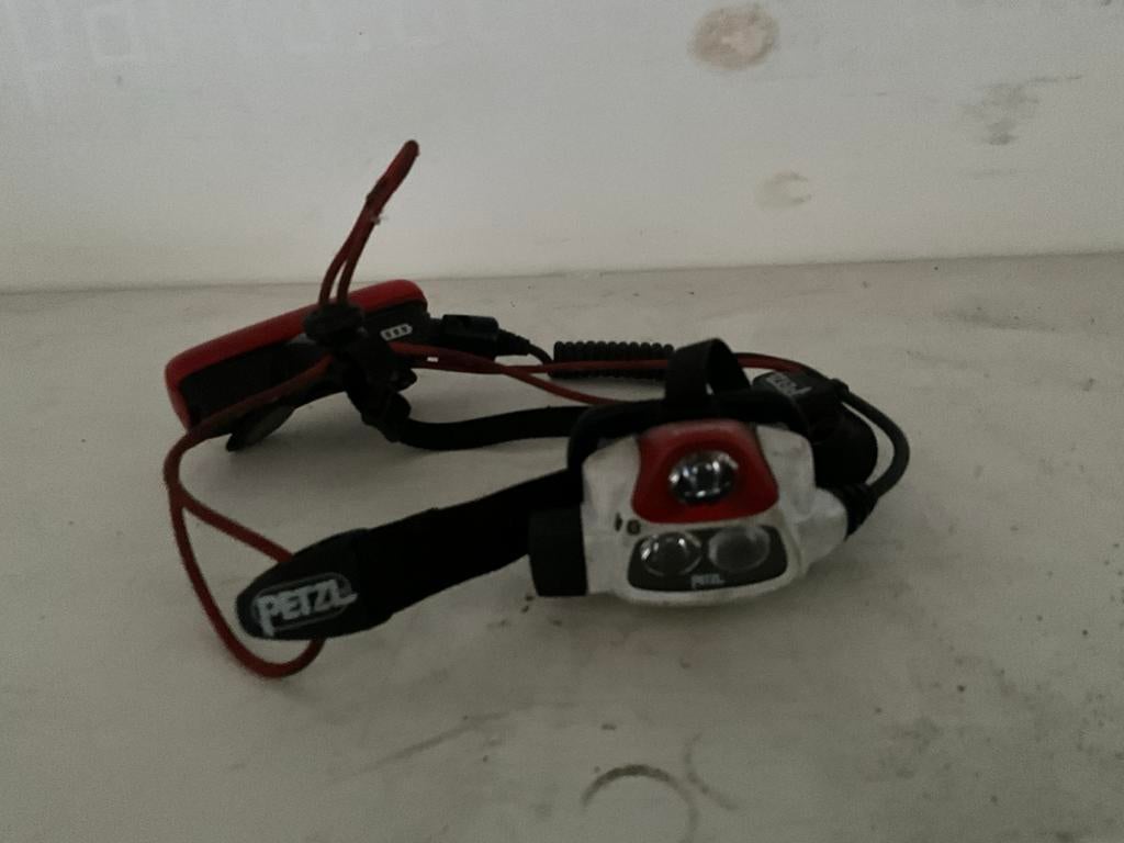 Petzl Nao+ hoofdlamp, Ophalen of Verzenden, Gebruikt, Accu