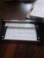 Papier snijder, Ophalen