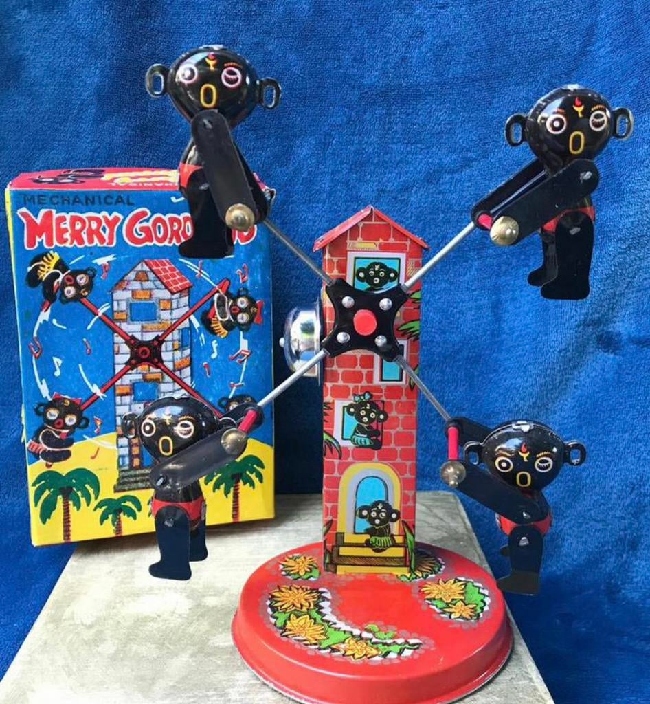 Antieke blikken draaimolen merry go round Yone in doos, Ophalen of Verzenden