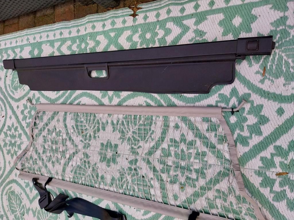 Bagagerolhoes en bagagenet Opel Zafira, Ophalen