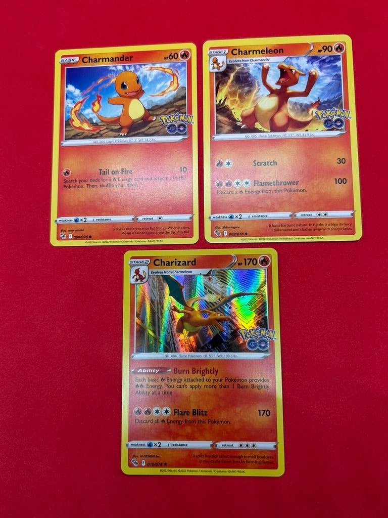 Pokémon GO Charizard Holo & Evolution Line Set, Ophalen of Verzenden, Zo goed als nieuw, Meerdere kaarten