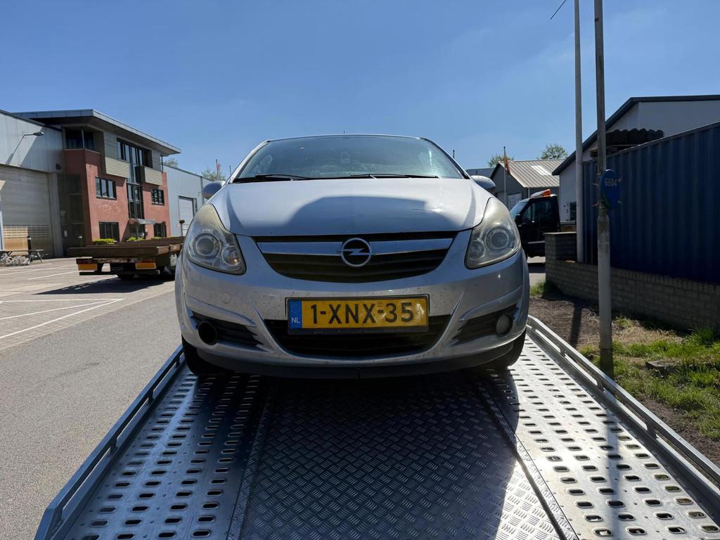 Opel Corsa 1.4-16V Cosmo AUTOMAAT APK (advertentie lezen), Auto's, Opel, 15 km/l, Gebruikt, Zwart, 4 cilinders