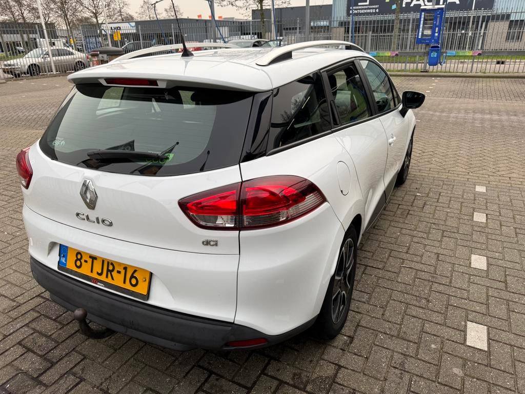 Renault Clio 1.5 DCI 66KW Estate 2014 Wit, Auto's, Voorwielaandrijving, 4 cilinders, 1096 kg, Wit