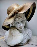 Zwaar betonnen beeld, Ophalen