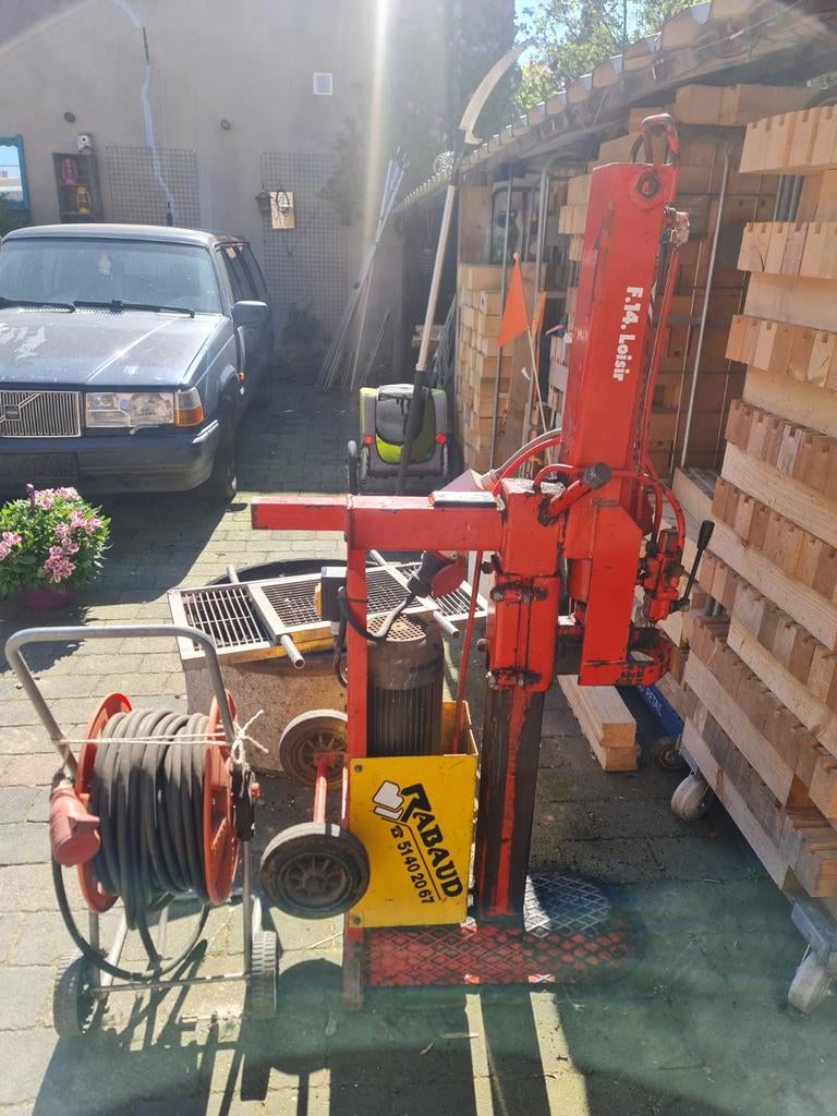 Houtklover met verlengkabel krachtstroom, Ophalen