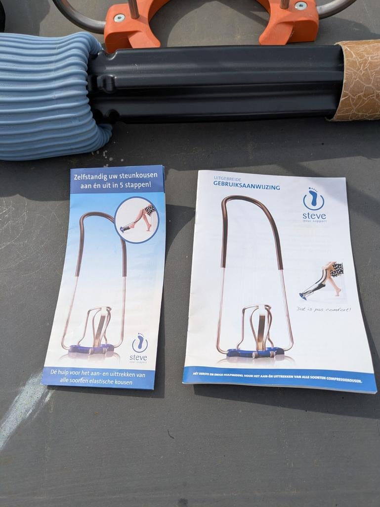 Sigvaris zelfstandig U steunkousen aandoen, Ophalen