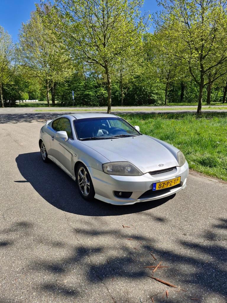 Hyundai Coupé 2.0 2005 Grijs, Auto's, 1282 kg, 4 stoelen, Handgeschakeld, 550 kg