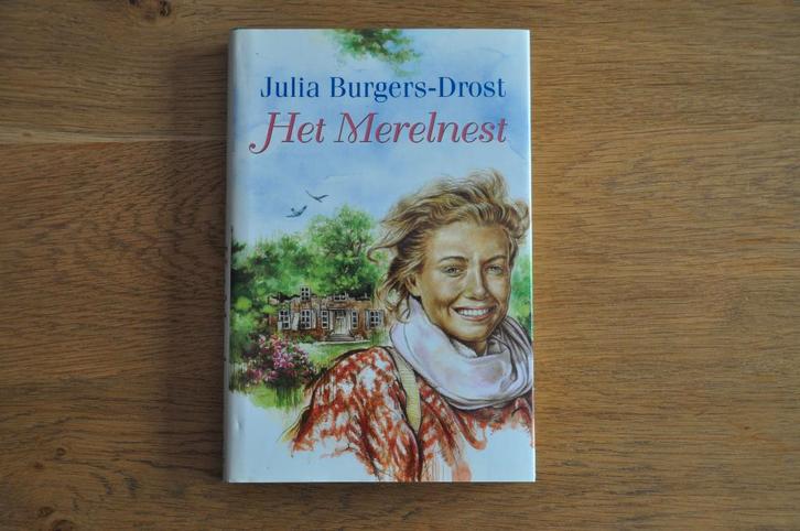 Julia Burgers-Drost - Het Merelnest (VCL), Boeken, Romans, Zo goed als nieuw, Nederland, Ophalen of Verzenden