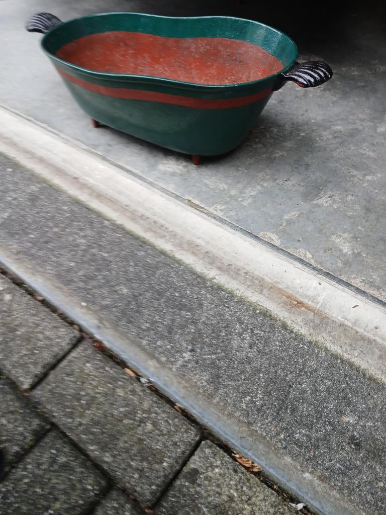 Gietijzeren kolenbak, Ophalen