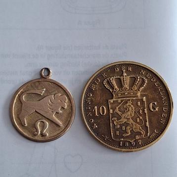 Gouden ster. Beeld en een replica  10 gulden. beschikbaar voor biedingen