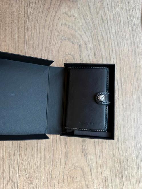 Secrid mini wallet zwart, Sieraden, Tassen en Uiterlijk, Portemonnees, Zo goed als nieuw, Zwart, Ophalen of Verzenden