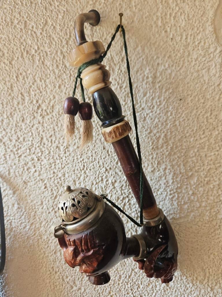 Oude decoratieve pijp, Ophalen