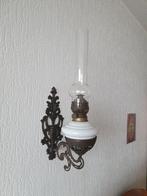 wand olielamp, Ophalen