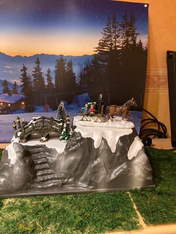 Koets en brug voor kerstdorp beschikbaar voor biedingen