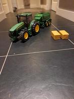 BruderJohn Deere trekker en balenpers met 4 balen., Hobby en Vrije tijd, Modelauto's | 1:32, Ophalen of Verzenden, Gebruikt, Tractor of Landbouw