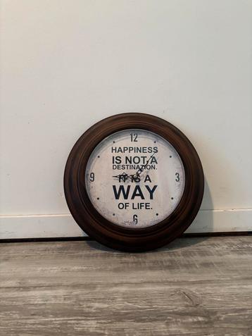 Wandklok met quote beschikbaar voor biedingen