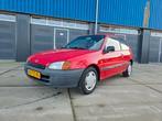 Toyota Starlet 1.3 16V AUT 1996 Rood 100.000km NAP, Auto's, Toyota, Stof, 4 cilinders, Starlet, 400 kg