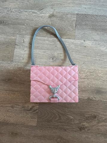 Speelgoed handtas met inhoud beschikbaar voor biedingen