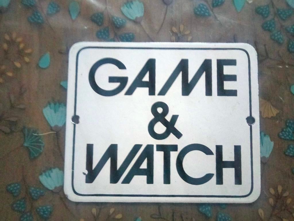 Emaille reclamebord game&watch Nintendo, Verzamelen, Speldjes, Pins en Buttons, Ophalen of Verzenden, Gebruikt, Transport