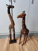 Houten giraffes, Ophalen