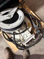 Twee x oliehaspel met vulslang, Ophalen, Gebruikt