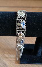 Een vintage dames armband met bloemen., Ophalen of Verzenden, Overige materialen, Armband