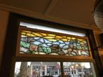Mooi geschilderd glas in lood, Ophalen
