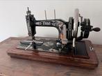 Erda antieke naaimachine, Ophalen