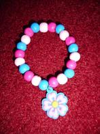 Armbandje van blauwe / rose kralen met bloem hangertje Nieuw, Nieuw, Armband, Ophalen of Verzenden, Roze