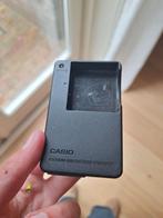 Gratis casio oplader zonder snoer, Audio, Tv en Foto, Ophalen of Verzenden, Zo goed als nieuw