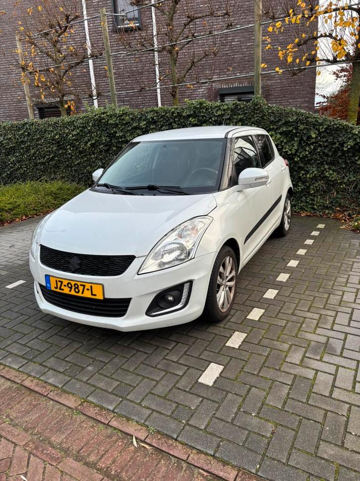Suzuki Swift 1.2 5-D 2015 Wit, Auto's, Suzuki, Particulier, Swift, Airbags, Airconditioning, Bluetooth, Centrale vergrendeling